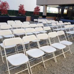 White folding plastic chairs