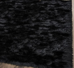 Black 4'x6' Faux Area Rug